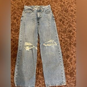 Distressed Blue Jeans
